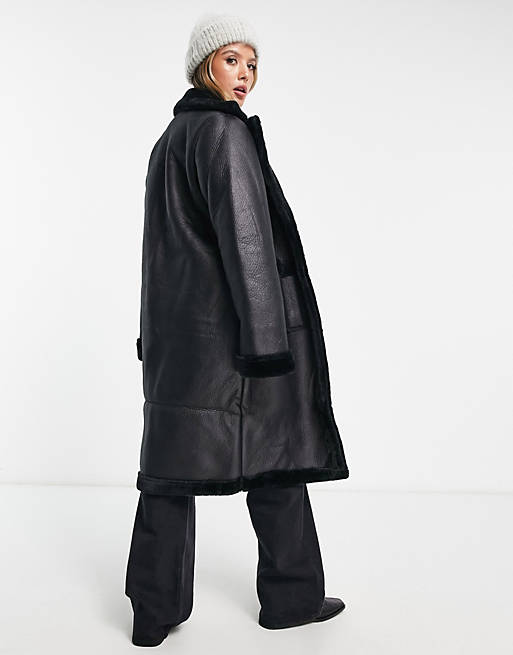 Vila longline faux shearling lined coat in black