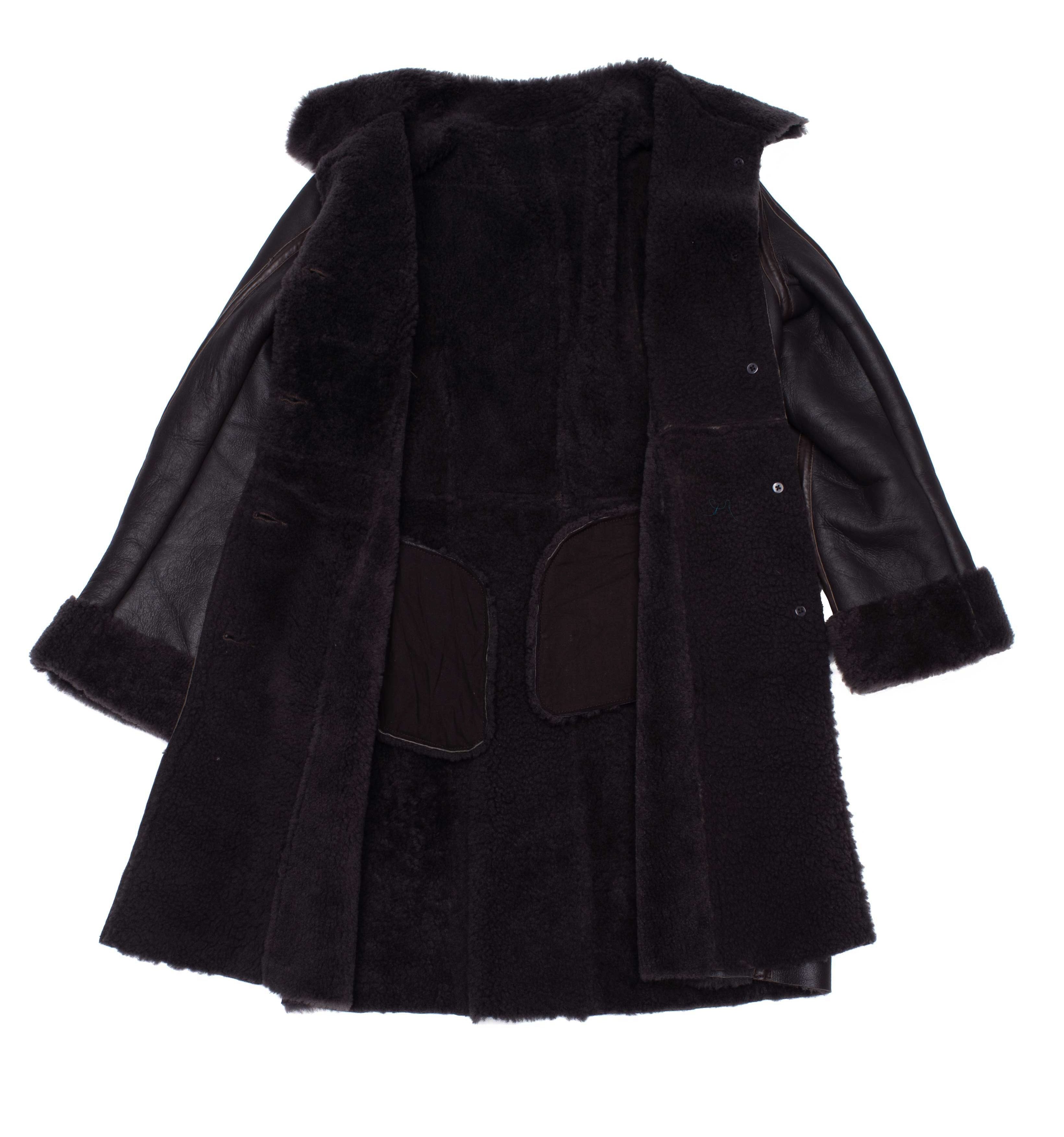 Shaunna's buttoned 3/4 length shearling coat