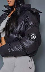BLACK HOODED PANEL PUFFER JACKETS